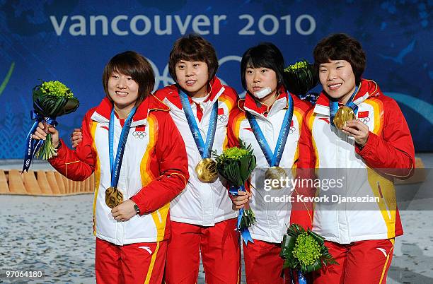 Team China celebrates receiving the gold medal during the medal ceremony for the ladies' 3000 m relay short track on day 14 of the Vancouver 2010...