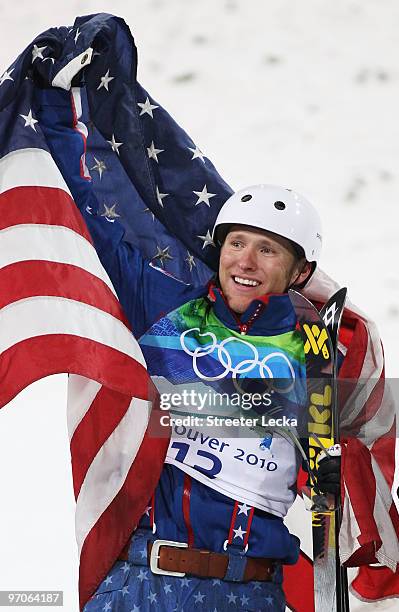 Jeret Peterson of the United States celebrates winning the silver medal during the freestyle skiing men's aerials final on day 14 of the Vancouver...