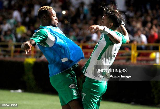 Dayro Moreno of Nacional celebrates with teammate Gustavo Torres after scoring the first goal of his team during the first leg match bewteen Deportes...