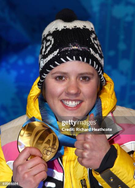 Viktoria Rebensburg of Germany celebrates receiving the gold medal and during the medal ceremony for the women's giant slalom alpine skiing on day 14...