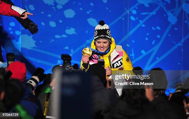 Viktoria Rebensburg of Germany celebrates receiving the gold medal and during the medal ceremony for the women's giant slalom alpine skiing on day 14...