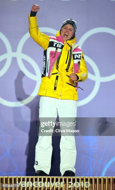 Viktoria Rebensburg of Germany celebrates receiving the gold medal and during the medal ceremony for the women's giant slalom alpine skiing on day 14...