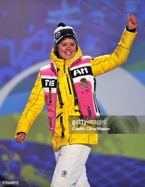 Viktoria Rebensburg of Germany celebrates receiving the gold medal and during the medal ceremony for the women's giant slalom alpine skiing on day 14...