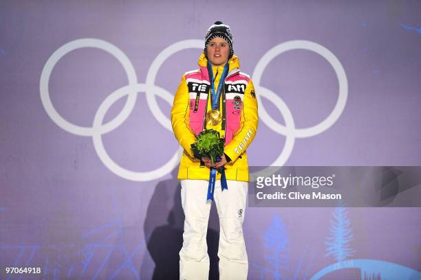 Viktoria Rebensburg of Germany celebrates receiving the gold medal and during the medal ceremony for the women's giant slalom alpine skiing on day 14...