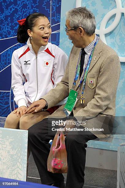 Akiko Suzuki of Japan sits in the kiss and cry area with coach Hiroshi Nagakubo in the Ladies Free Skating on day 14 of the 2010 Vancouver Winter...