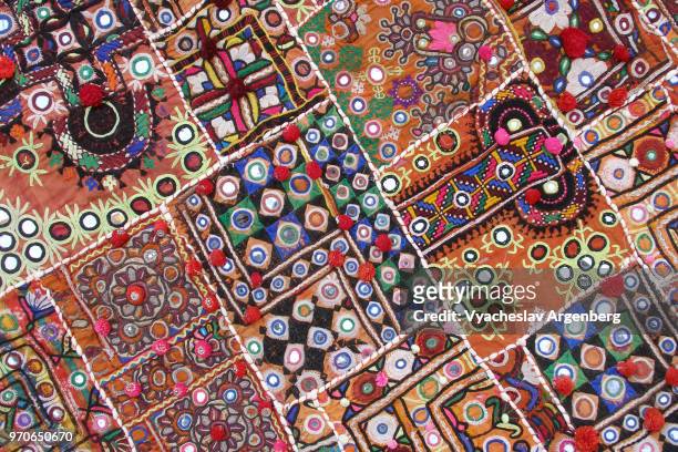 colorful fabric artwork, ornamental patterns on textile, jaisalmer, india - indian subcontinent stockfoto's en -beelden