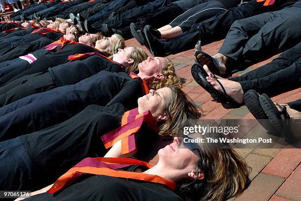 May 2007 CREDIT: Katherine Frey / TWP. Bethesda, MD. Thirty-two women, representing the 32 Virginia Tech victims, stage a lie-in for a few minutes to...