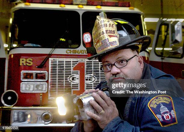 Dec. 17, 2006 Slug: me-firebuff1 assignment Photographer: Gerald Martineau DC fire station 500 F St, NW Volunteer firefighter videographer We...