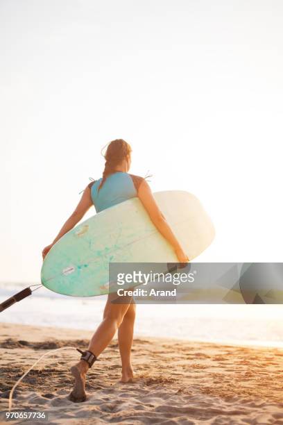 young surfer woman - puerto escondido stock pictures, royalty-free photos & images