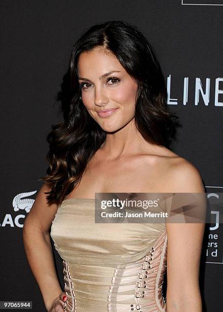 Actress Minka Kelly arrives at the 12th Annual Costume Designers Guild Awards with Presenting Sponsor Swarovski at The Beverly Hilton hotel on...