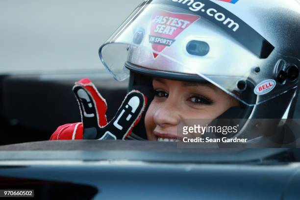 Jessica Graf prepares to ride in the two seater pace car prior to the Verizon IndyCar Series DXC Technology 600 at Texas Motor Speedway on June 9,...