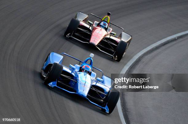 Ed Jones, driver of the NTT Data Chip Ganassi Racing Honda, leads Robert Wickens, driver of the Lucas Oil SPM Honda, during the Verizon IndyCar...