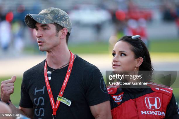 Cody Nickson and Jessica Graf attend the Verizon IndyCar Series DXC Technology 600 at Texas Motor Speedway on June 9, 2018 in Fort Worth, Texas.