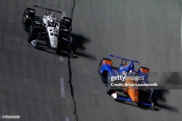 Scott Dixon, driver of the PNC Bank Chip Ganassi Racing Honda, leads Simon Pagenaud, driver of the DXC Technology Team Penske Chevrolet, during the...