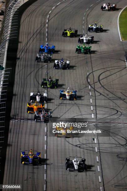 Simon Pagenaud, driver of the DXC Technology Team Penske Chevrolet, leads the field during the Verizon IndyCar Series DXC Technology 600 at Texas...