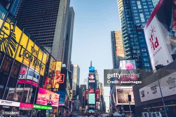 bright advertising screens on times square,new york - times square manhattan bildbanksfoton och bilder