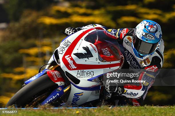 Carlos Checa of Spain and the Althea Racing Team rounds the bend during practice ahead of round one for the Superbike World Championship at Phillip...