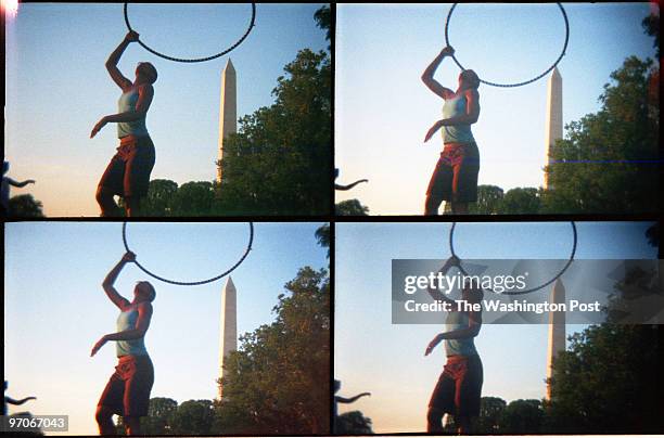 Sarah L. Voisin Washington, DC NEG NUMBER: Photographs for the Summer Series for the hula hoop icon. PICTURED: A group of local hula hoopers gathered...