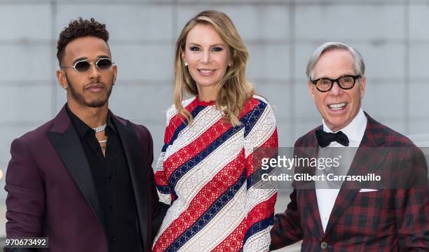 Formula One driver Lewis Hamilton, designers Dee Ocleppo and Tommy Hilfiger are seen arriving to the 2018 CFDA Fashion Awards at Brooklyn Museum on...