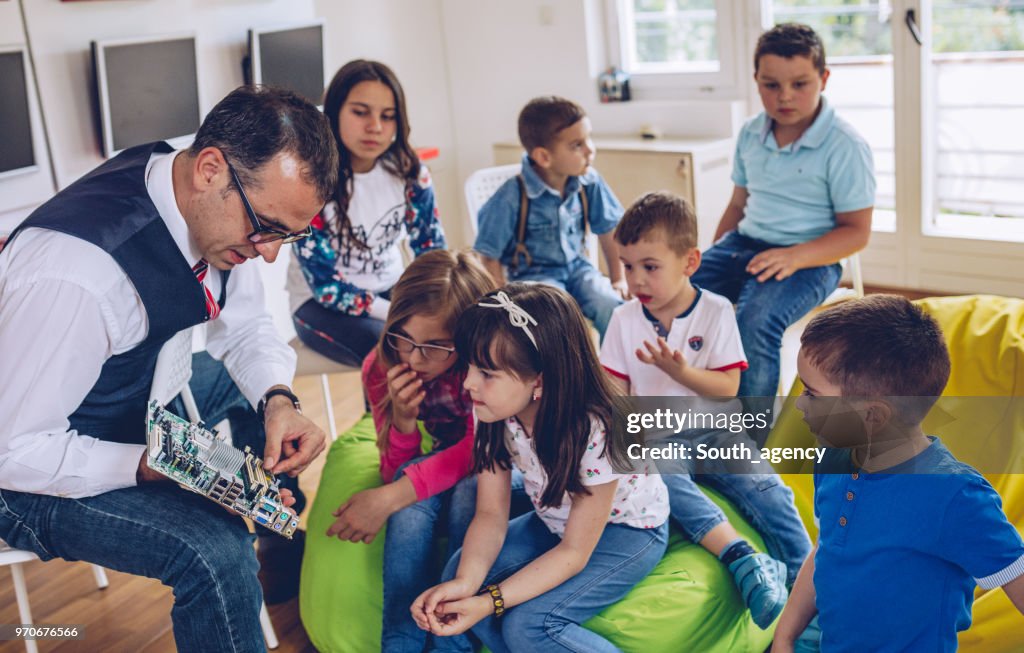 Kids Using Hardware Kids Learning About Computer Hardware High-Res Stock Photo - Getty Images