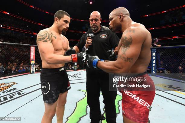 Robert Whittaker of New Zealand and Yoel Romero of Cuba touch gloves prior to their middleweight fight during the UFC 225 event at the United Center...