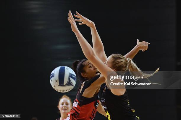 Monica Falkner of the Magic is challenged by Temalisi Fakahokotau of the Tactix during the round six ANZ Premiership match between the Mainland...