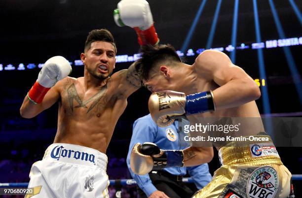Leo Santa Cruz battles to defeat Abner Mares in their WBA Featherweight Title & WBC Diamond Title fight at Staples Center on June 9, 2018 in Los...
