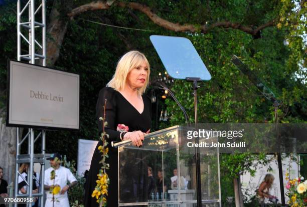 President & CEO Debbie Levin speaks onstage at the Environmental Media Association 1st Annual Honors Benefit Gala on June 9, 2018 in Los Angeles,...