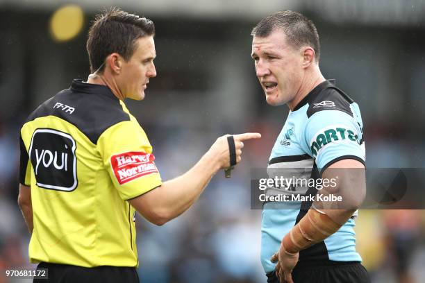 Paul Gallen of the Sharks makes his point to referee Adam Gee during the round 14 NRL match between the Cronulla Sharks and the Wests Tigers at...