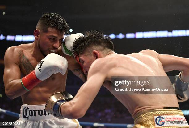 Leo Santa Cruz battles to defeat Abner Mares in their WBA Featherweight Title & WBC Diamond Title fight at Staples Center on June 9, 2018 in Los...