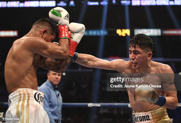 Leo Santa Cruz battles to defeat Abner Mares in their WBA Featherweight Title & WBC Diamond Title fight at Staples Center on June 9, 2018 in Los...