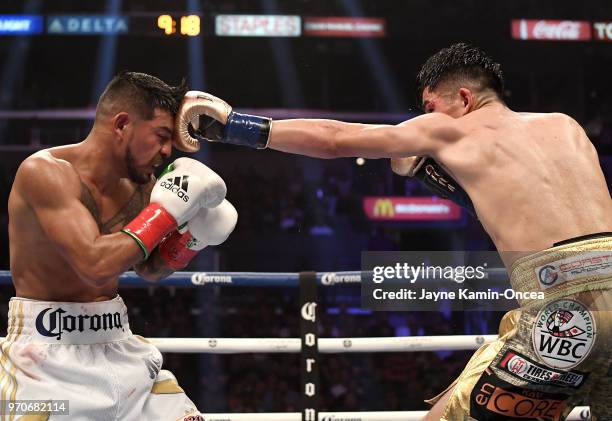 Leo Santa Cruz battles to defeat Abner Mares in their WBA Featherweight Title & WBC Diamond Title fight at Staples Center on June 9, 2018 in Los...