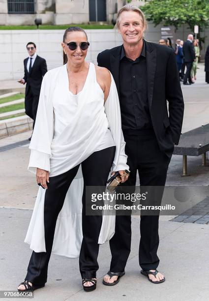 Fashion designer Donna Karan and photographer Russell James are seen arriving to the 2018 CFDA Fashion Awards at Brooklyn Museum on June 4, 2018 in...