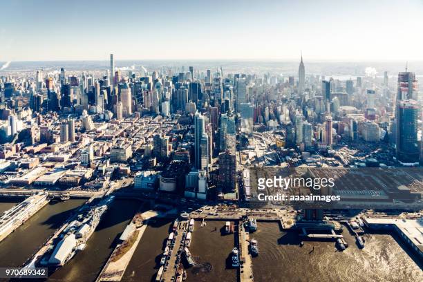 helicopter aerial view of new york city skyline and harbor - helicopter point of view stock pictures, royalty-free photos & images