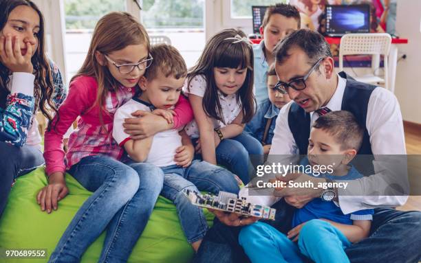 Kids Using Hardware 534 Cute Circuit Stock Photos, High-Res Pictures, and Images - Getty Images