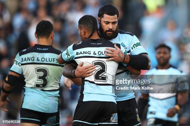 Sione Katoa and Andrew Fifita of the Sharks celebrate victory during the round 14 NRL match between the Cronulla Sharks and the Wests Tigers at...