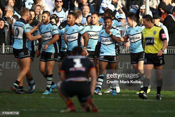 Jesse Ramien of the Sharks celebrates with his team mates after scoring a try during the round 14 NRL match between the Cronulla Sharks and the Wests...