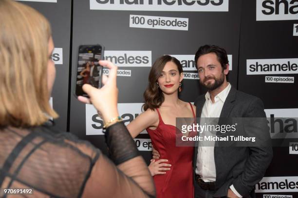 Actors Emmy Rossum and Justin Chatwin attend the celebration of the 100th episode of Showtime's "Shameless" at DREAM Hollywood on June 9, 2018 in...
