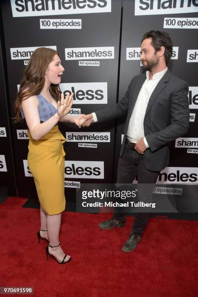 Actors Emma Kenney and Justin Chatwin attend the celebration of the 100th episode of Showtime's "Shameless" at DREAM Hollywood on June 9, 2018 in...