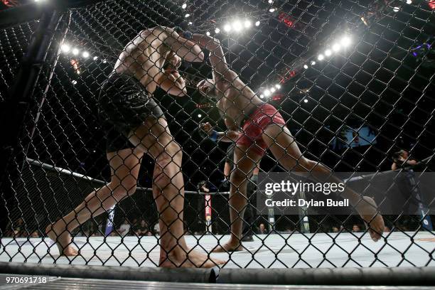 Yoel Romero of Cuba attempts a punch against Robert Whittaker of New Zealand in the third round in their middleweight title fight during the UFC 225:...