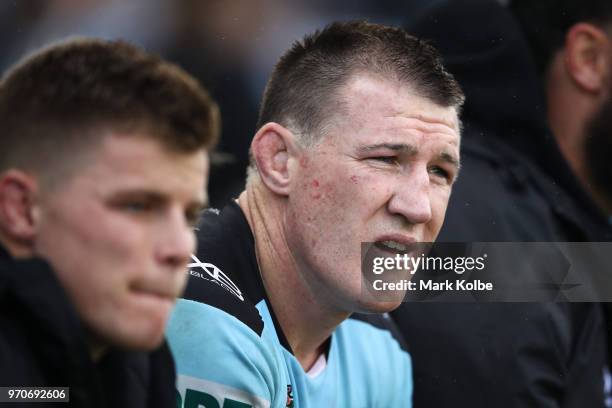 Paul Gallen of the Sharks watches on from the bench during the round 14 NRL match between the Cronulla Sharks and the Wests Tigers at Southern Cross...