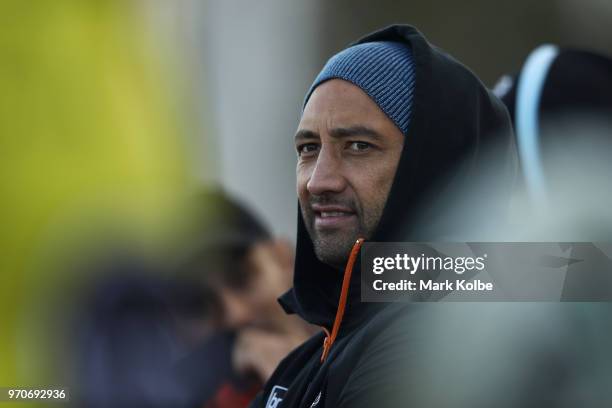 Injured Tigers player Benji Marshall watches on during the round 14 NRL match between the Cronulla Sharks and the Wests Tigers at Southern Cross...