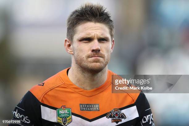 Chris Lawrence of the Tigers looks dejected after defeat during the round 14 NRL match between the Cronulla Sharks and the Wests Tigers at Southern...