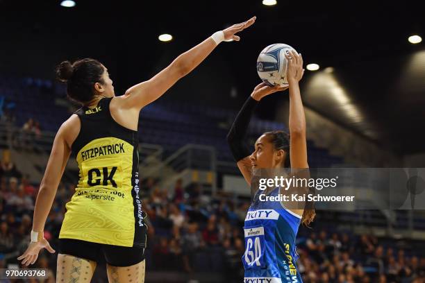 Maria Folau of the Mystics is challenged by Sulu Fitzpatrick of the Pulse during the round six ANZ Premiership match between the Central Pulse and...