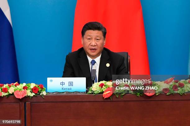 Chinese President Xi Jinping gives a speech at a signing ceremony during the Shanghai Cooperation Organisation Summit in Qingdao, Chinas Shandong...