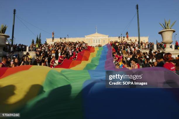 Rainbow flag seen during the pride parade. LGBT community of Greece organized Athens Pride Festival in Athens to promote and parade their rights....