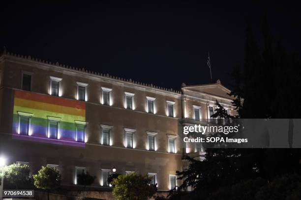 Big pride flag with rainbow colors seen front of the Greek Parliament at the festival. This year's Pride theme was discrimination against women, with...