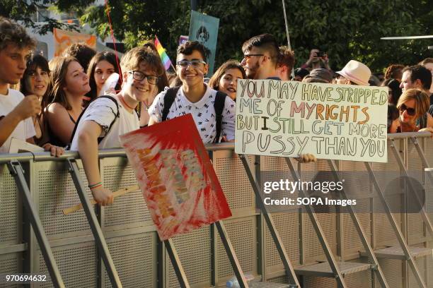 Participants seen displaying placards during the parade. LGBT community of Greece organized Athens Pride Festival in Athens to promote and parade...