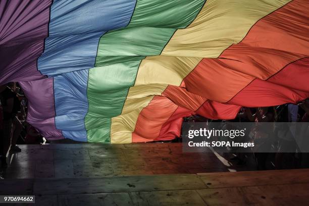 Big pride flag with rainbow colors seen at the festival. This year's Pride theme was discrimination against women, with transnational women receiving...