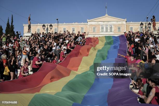 Big pride flag with rainbow colors seen front of the Greek Parliament at the festival. This year's Pride theme was discrimination against women, with...